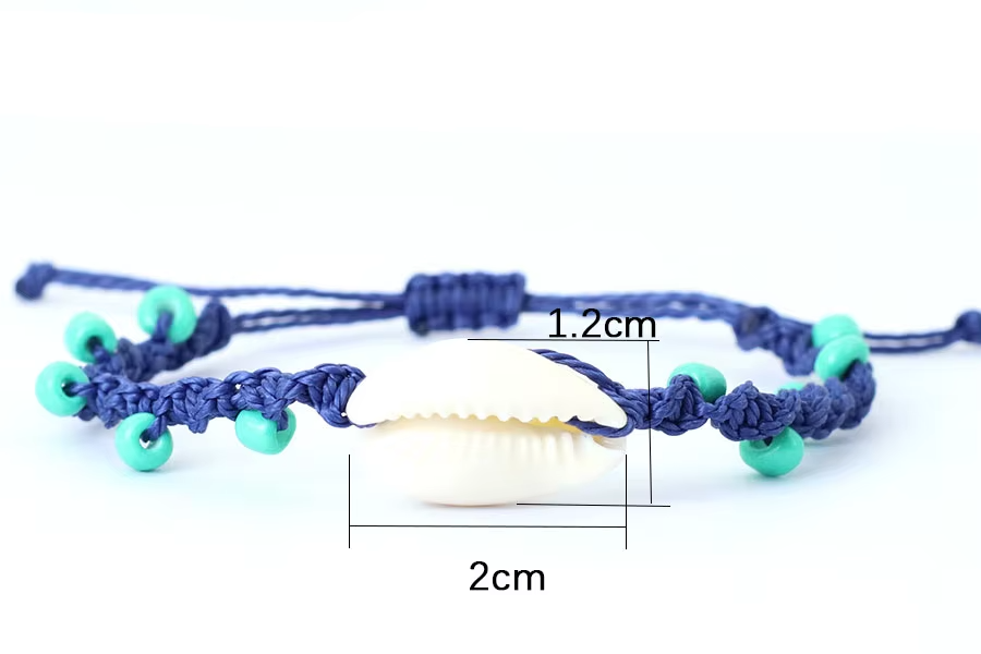 Handgefertigtes Makramee Surf Armband mit Muschel und 4 mm Howlith Perlen
