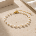 Elegantes 18 Karat vergoldetes Perlenarmband für Damen aus hochwertigem Edelstahl mit verstellbarer Gliederkette