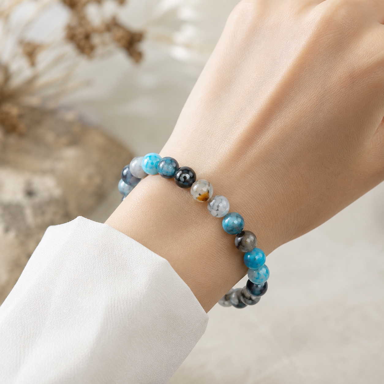 Elegantes Naturstein Armband für Herren mit blauem Drachenader Achat für Energie Balance Mut und Stärke