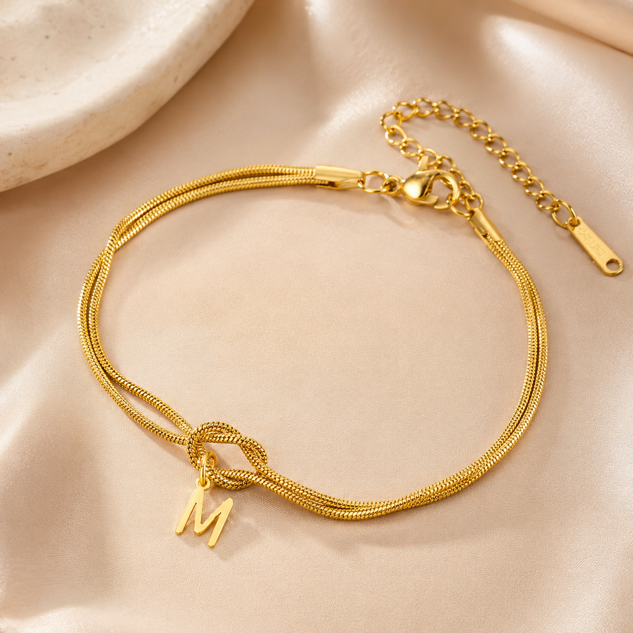 Personalisierbares Initialen Armband für Damen und Herren aus Edelstahl mit Liebesknoten