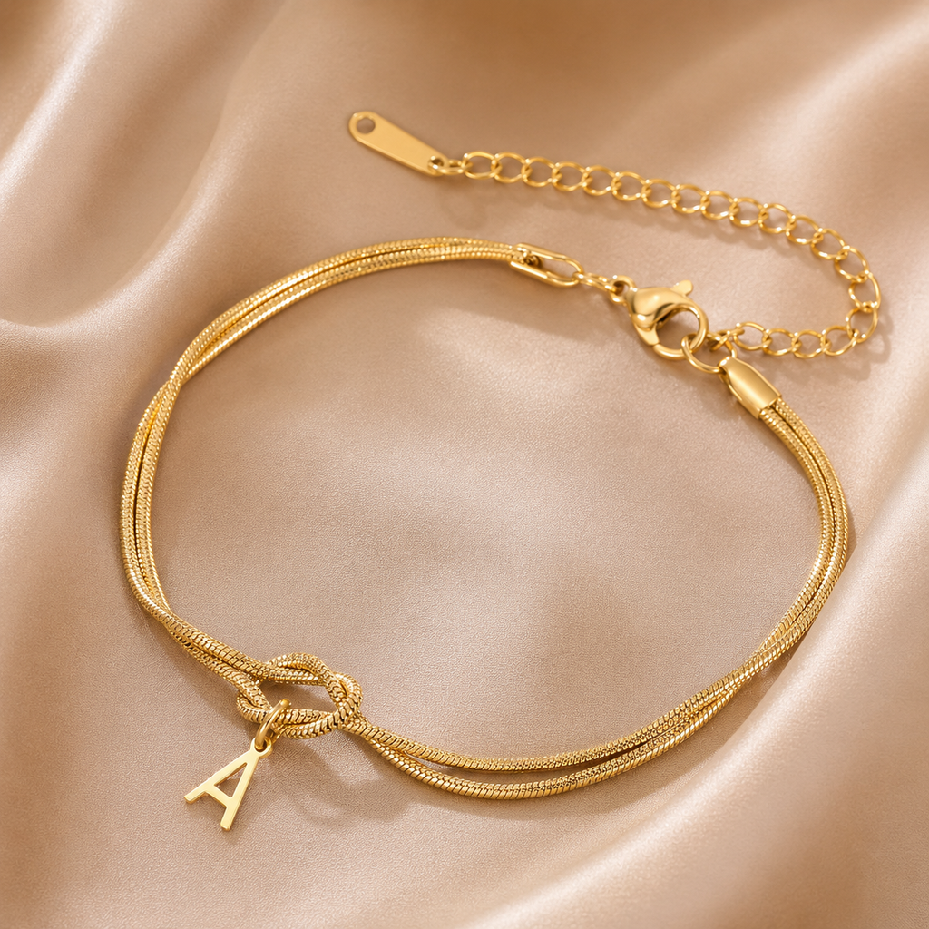 Personalisierbares Initialen Armband für Damen und Herren aus Edelstahl mit Liebesknoten