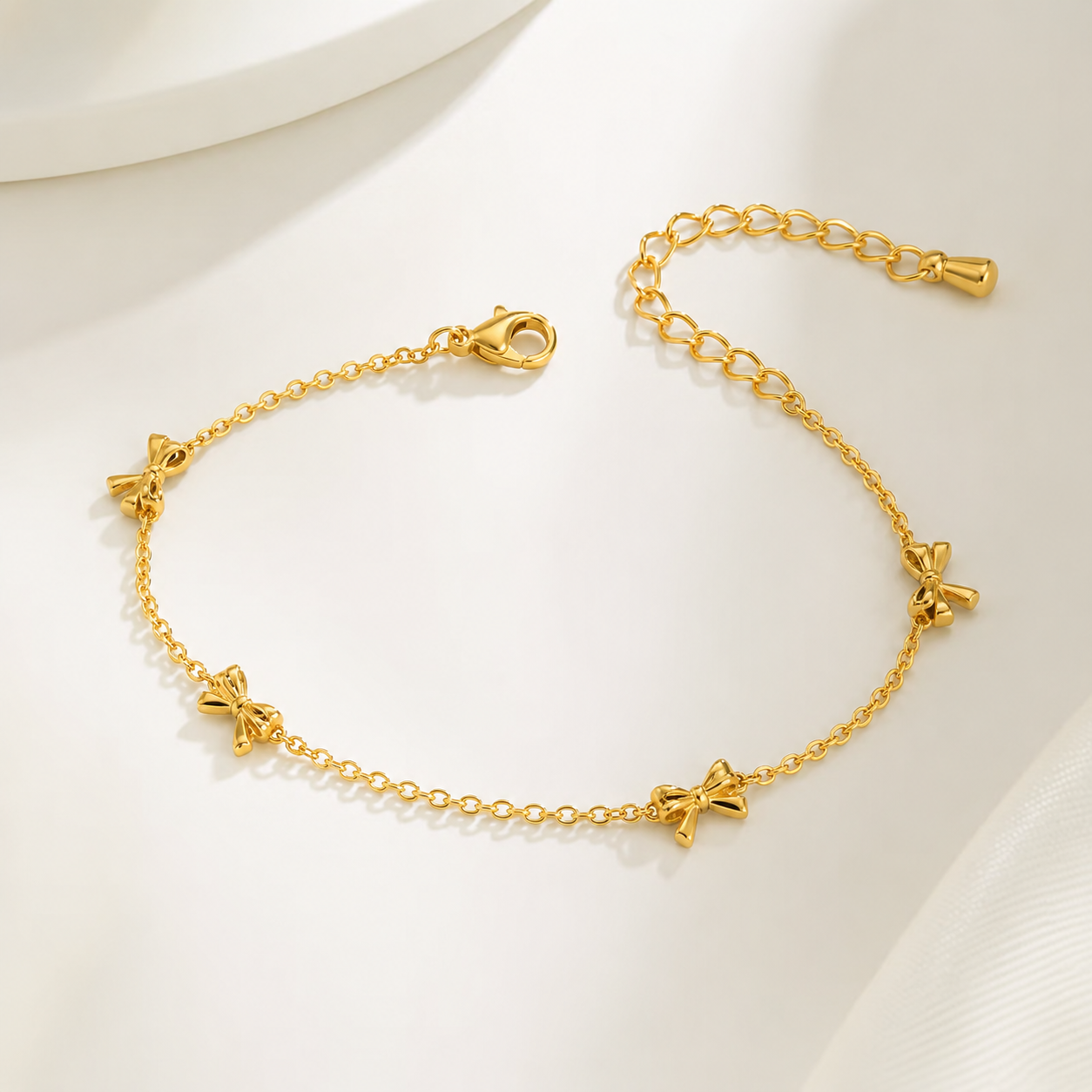 Klassisches goldfarbenes Schleifenarmband für Damen aus hochwertigem Edelstahl mit eleganter Rolo Kette