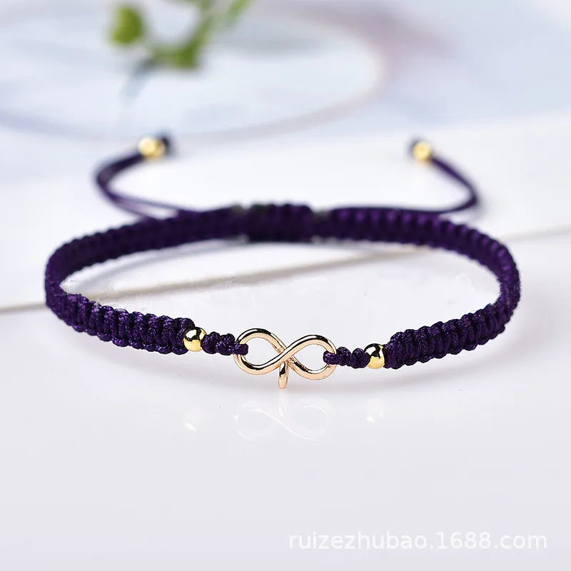 Natürliches Infinity Symbol Glücksarmband aus rotem Rope handgefertigt mit verstellbarer Glücksperle