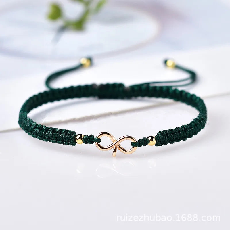 Natürliches Infinity Symbol Glücksarmband aus rotem Rope handgefertigt mit verstellbarer Glücksperle