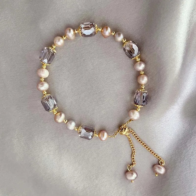 Damen‑Armband mit lila Imitationsperlen und Kristall‑Akzenten