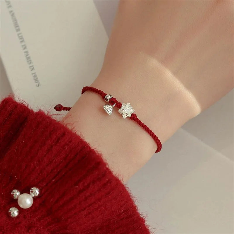 Lotus‑Armband aus geflochtenem Textilseil