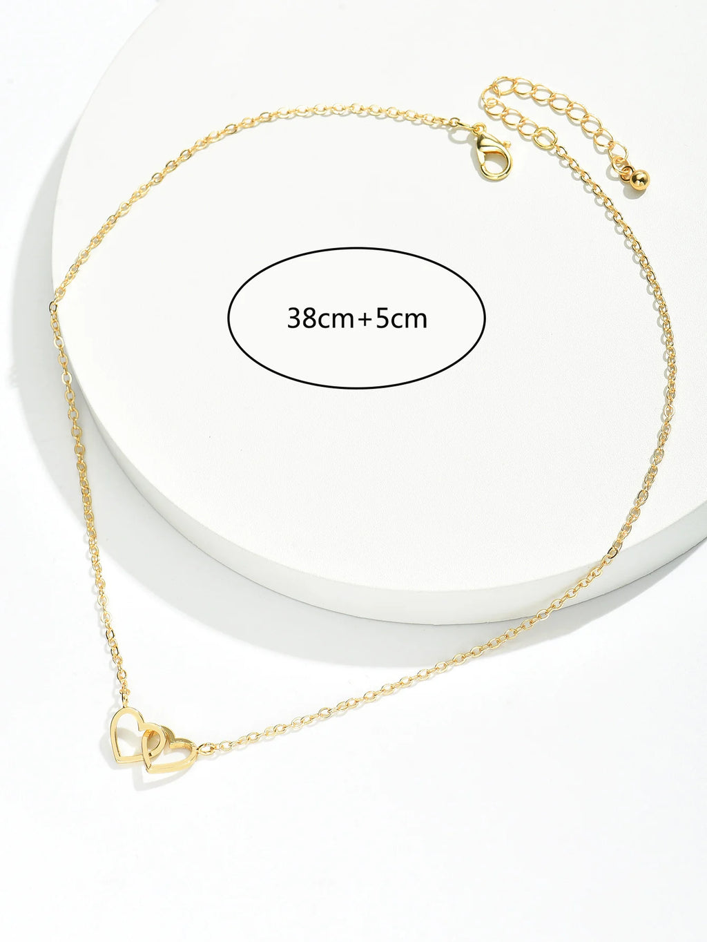 Feine Damenkette mit zwei hohlen Herzmotiven im minimalistischen Design