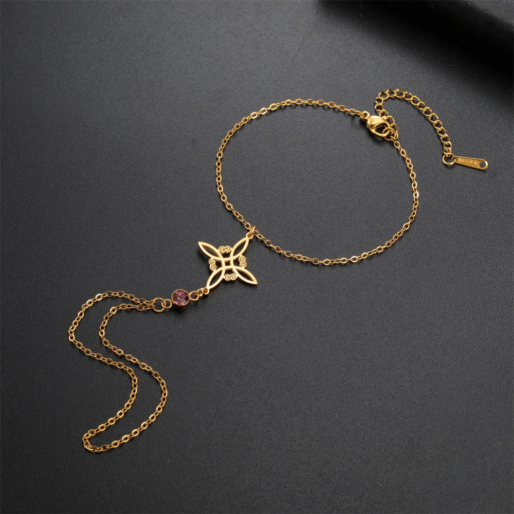 Fingerring‑Armband mit Hexenknoten, ein kraftvolles Amulett für Schutz