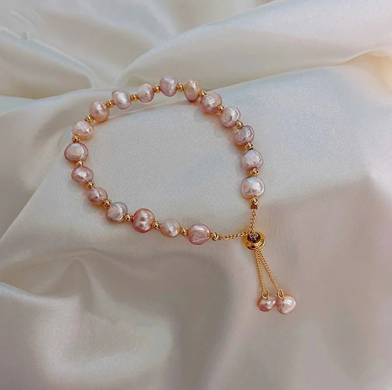 Damen‑Armband mit lila Imitationsperlen und Kristall‑Akzenten