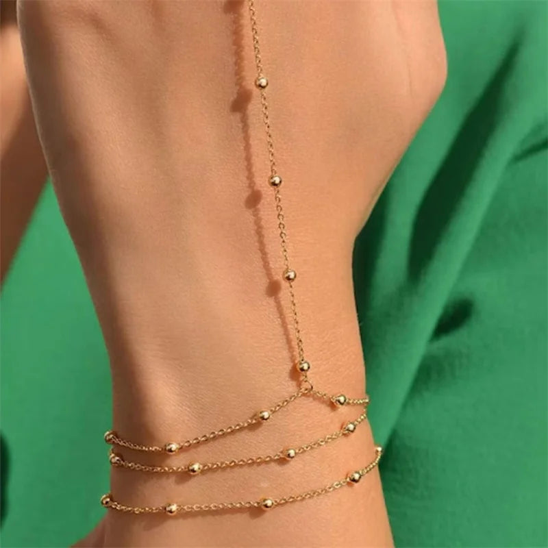 Zartes Kettenarmband mit verbundenem Fingerring