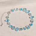 Elegantes Tennisarmband in Violett und Blau mit Zirkonia und modernem Geometry Look