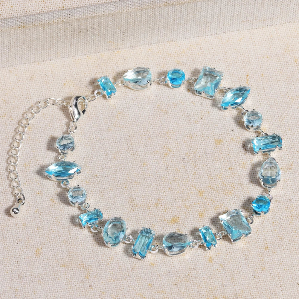 Elegantes Tennisarmband in Violett und Blau mit Zirkonia und modernem Geometry Look