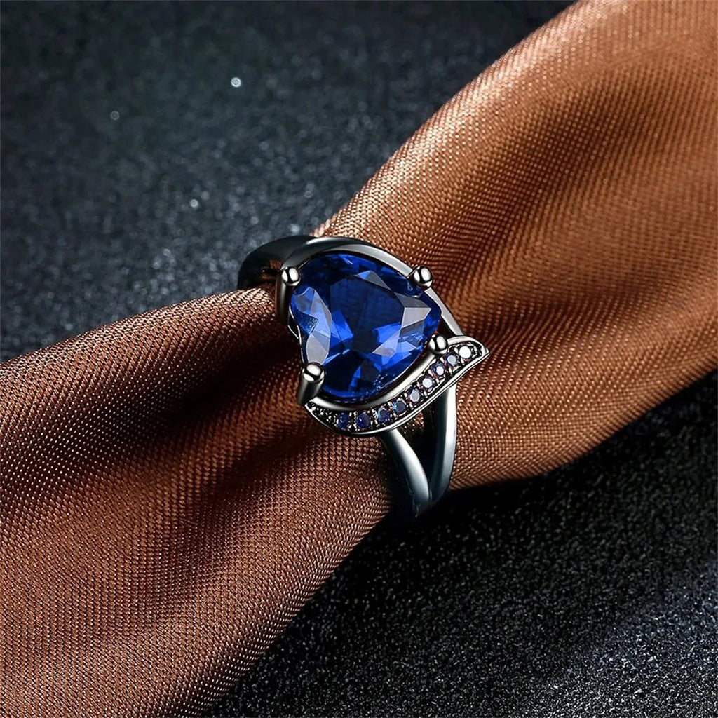 Modische Paarringe, elegant mit Herzmotiv und blauen Zirkon-Rhinestones