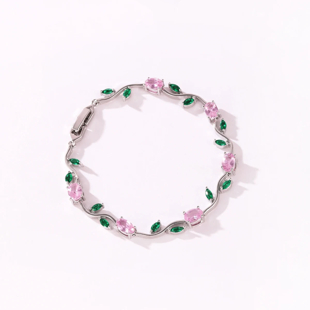 Zartes Armband mit tulpenrosa Zirkonia und filigranen Rankenblumen