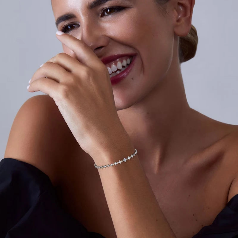 Exquisites Moissanit Schmuckarmband mit 5,0 mm 4,5 mm und 4 mm runden Steinen in luxuriösem Gold Finish