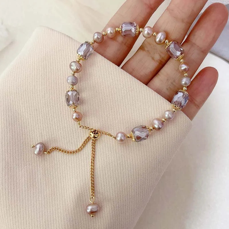 Damen‑Armband mit lila Imitationsperlen und Kristall‑Akzenten
