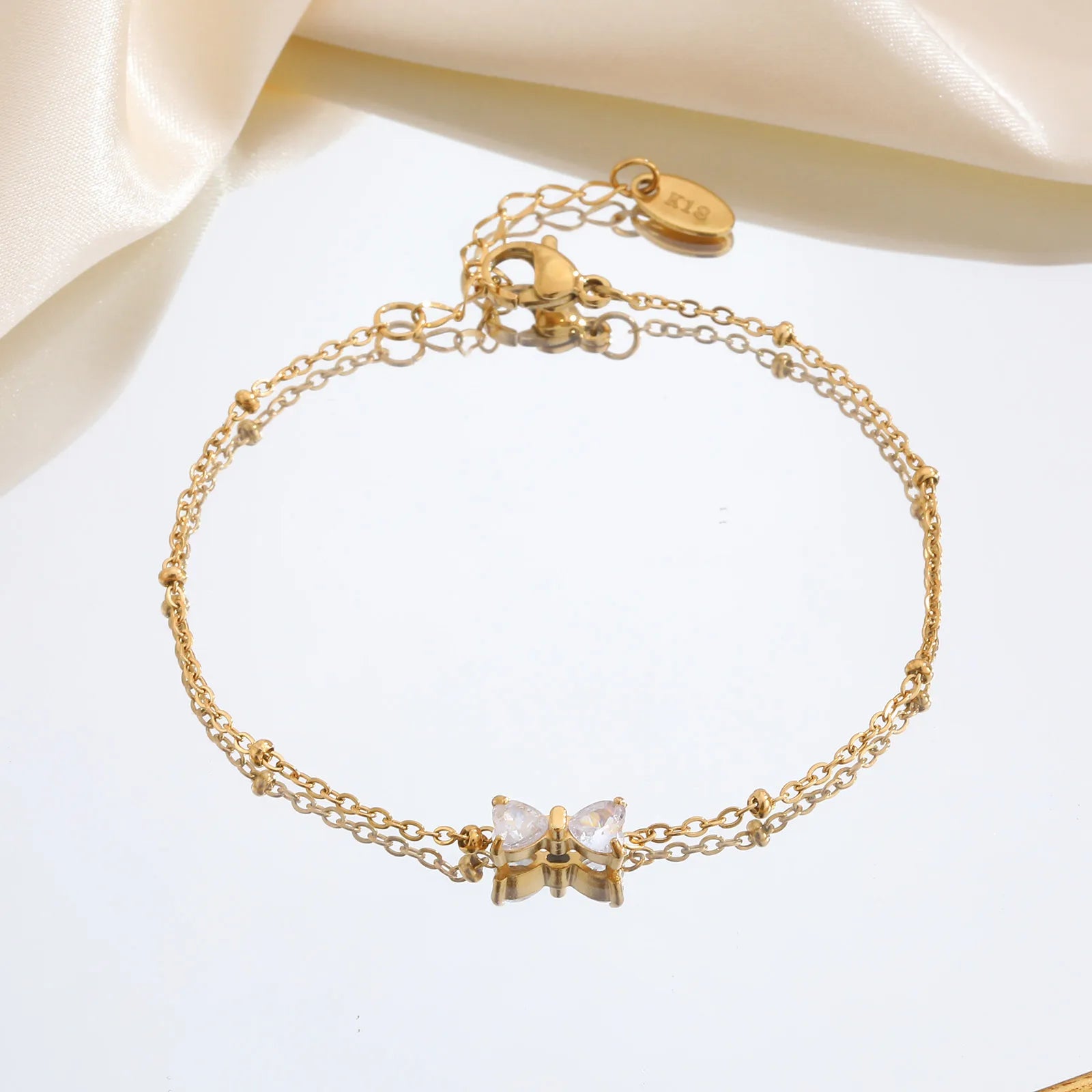 Süßes Bowknot‑Armband mit Zirkonia‑Steinen