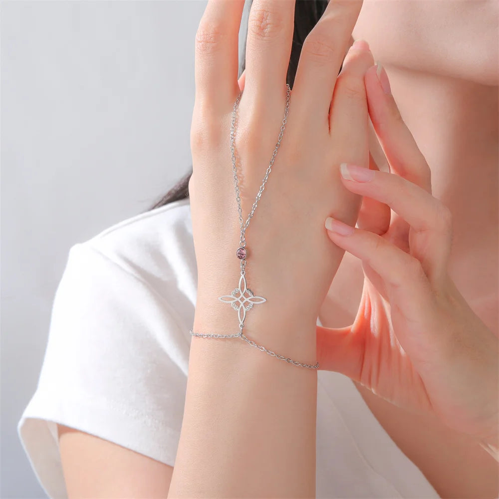 Fingerring‑Armband mit Hexenknoten, ein kraftvolles Amulett für Schutz