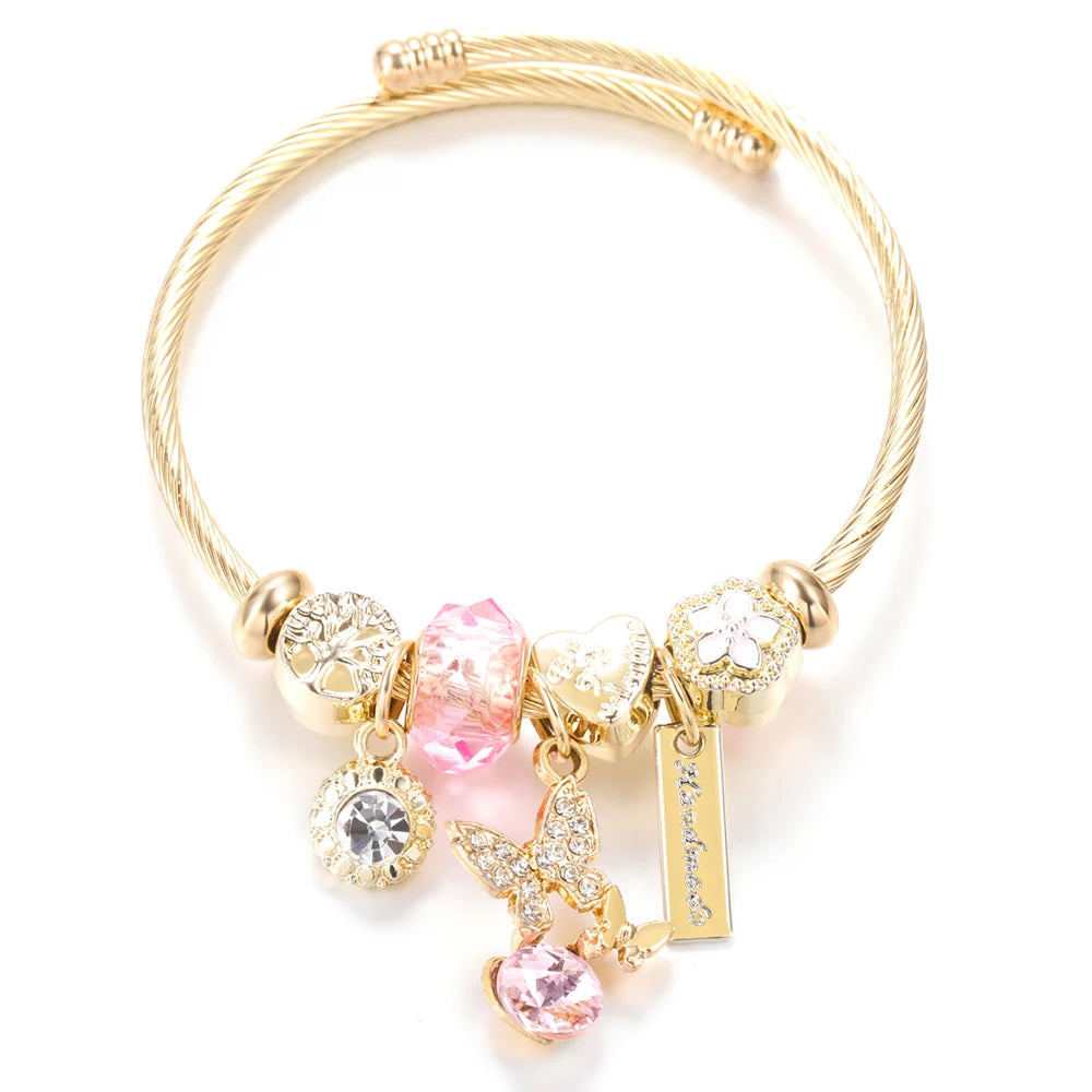 Elegante Frauenarmband mit Herz‑ und Ballerina‑Motiven, stilvolles Accessoire