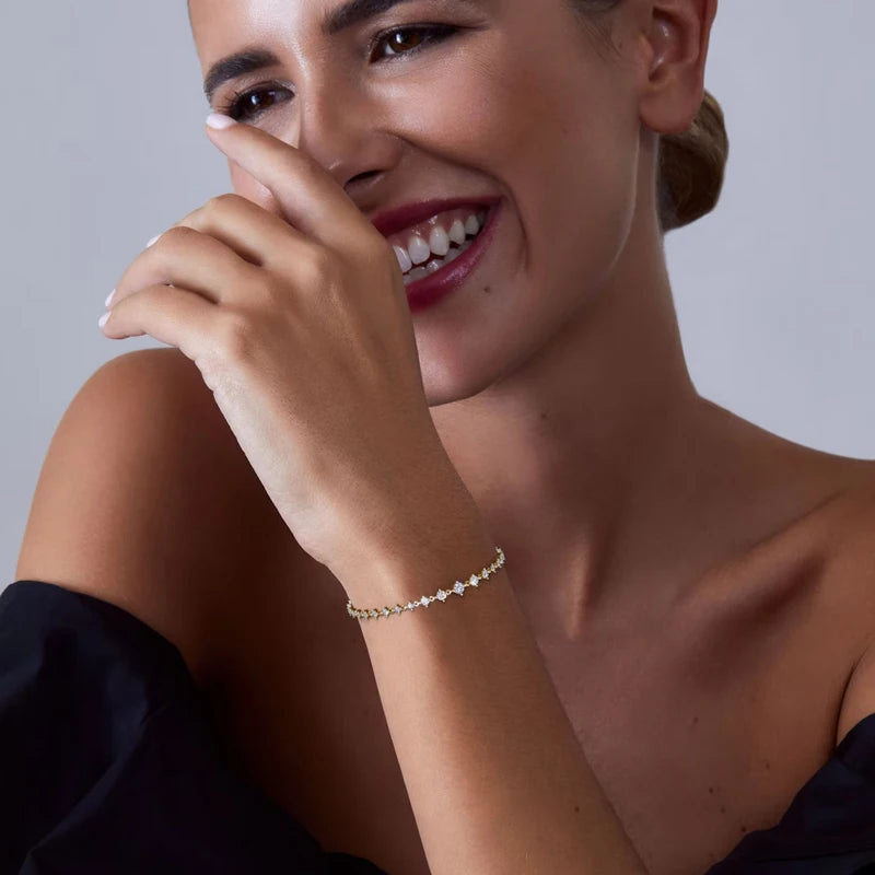 Exquisites Moissanit Schmuckarmband mit 5,0 mm 4,5 mm und 4 mm runden Steinen in luxuriösem Gold Finish