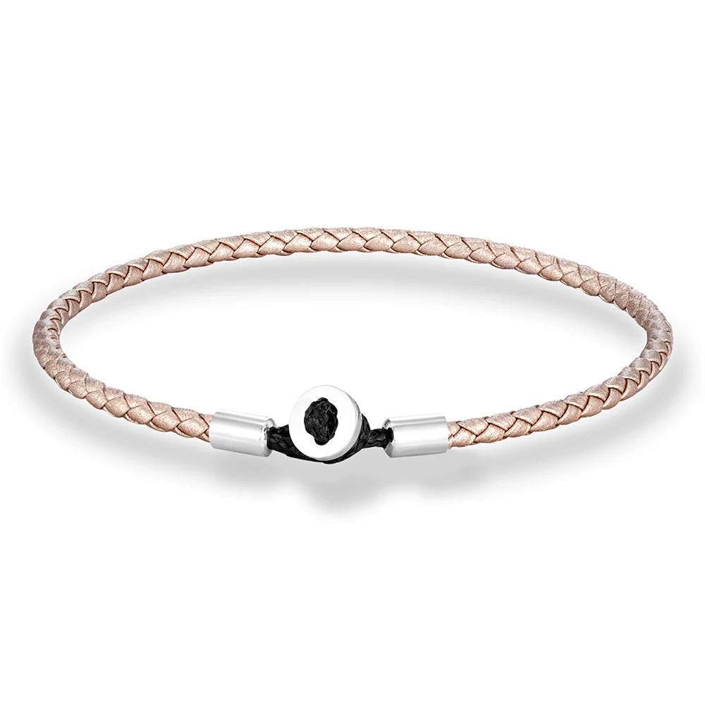 Geflochtenes Lederarmband mit Edelstahl‑Knopf
