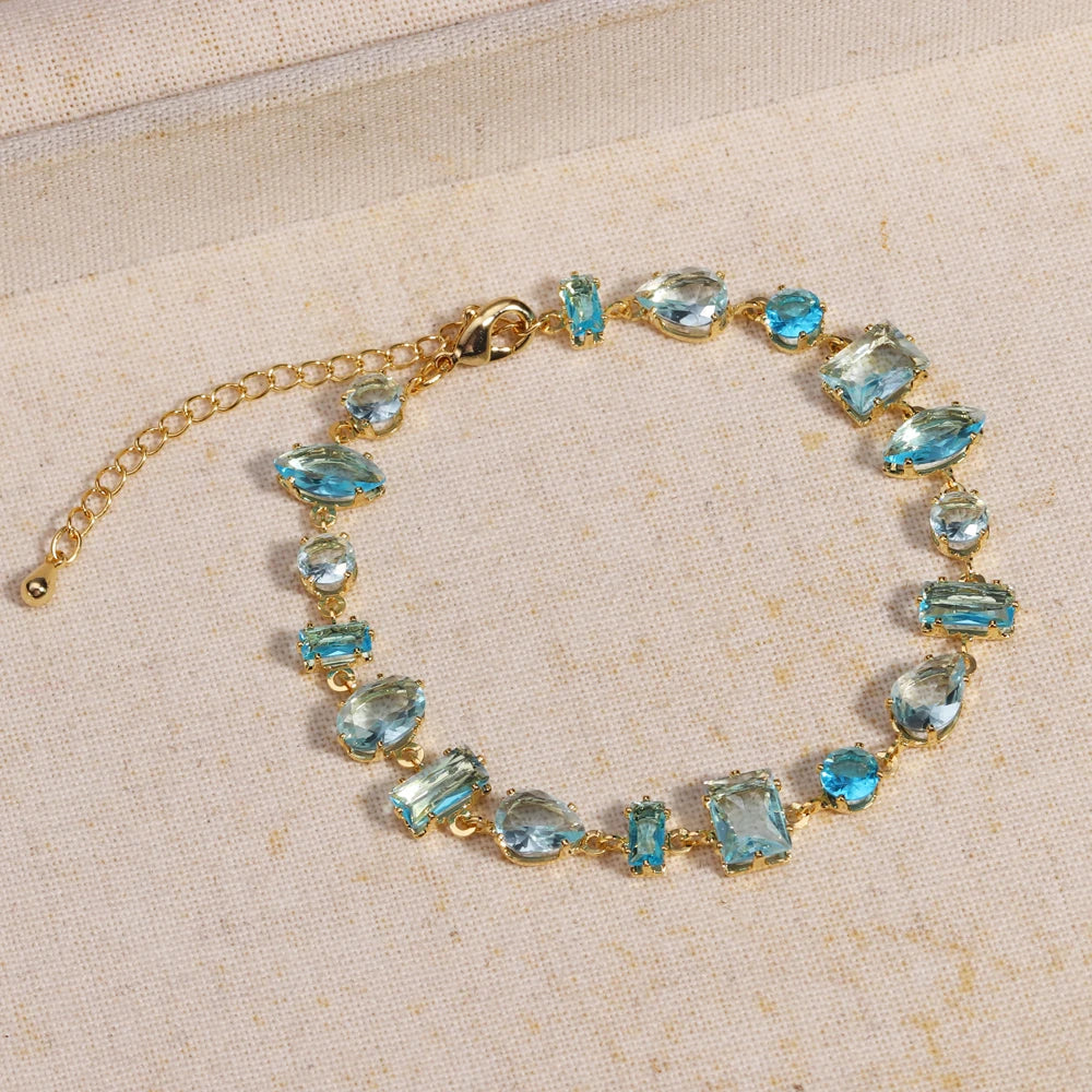 Elegantes Tennisarmband in Violett und Blau mit Zirkonia und modernem Geometry Look