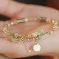 Trendiges grünes Jade‑Armband mit Bambus‑Gliedern & Maiglöckchen‑Charm