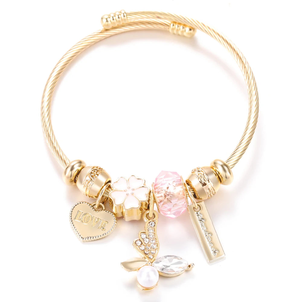 Elegante Frauenarmband mit Herz‑ und Ballerina‑Motiven, stilvolles Accessoire