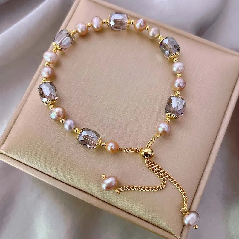 Damen‑Armband mit lila Imitationsperlen und Kristall‑Akzenten