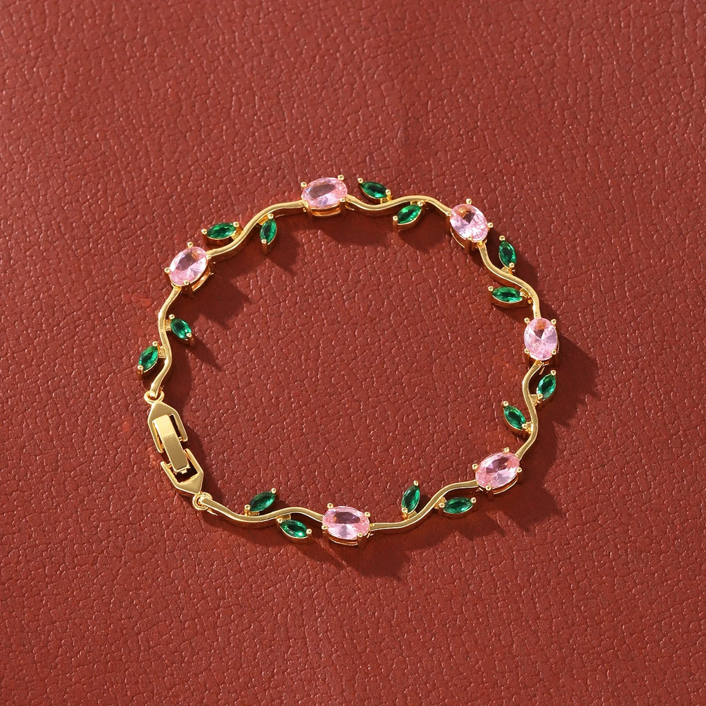Zartes Armband mit tulpenrosa Zirkonia und filigranen Rankenblumen