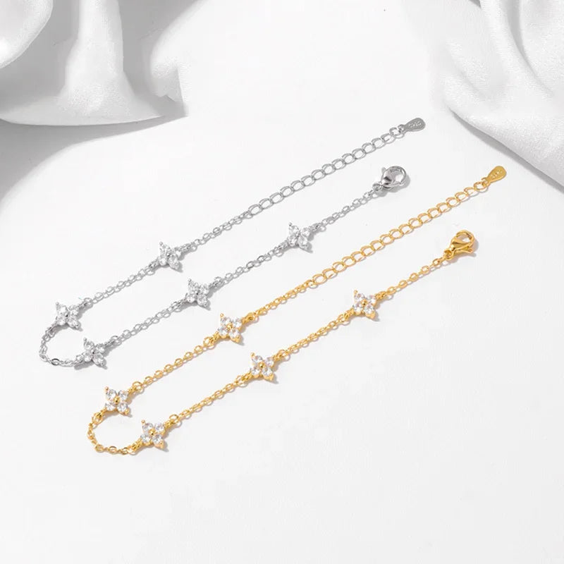 Zartes Vierblatt-Blumenarmband mit Zirkonia