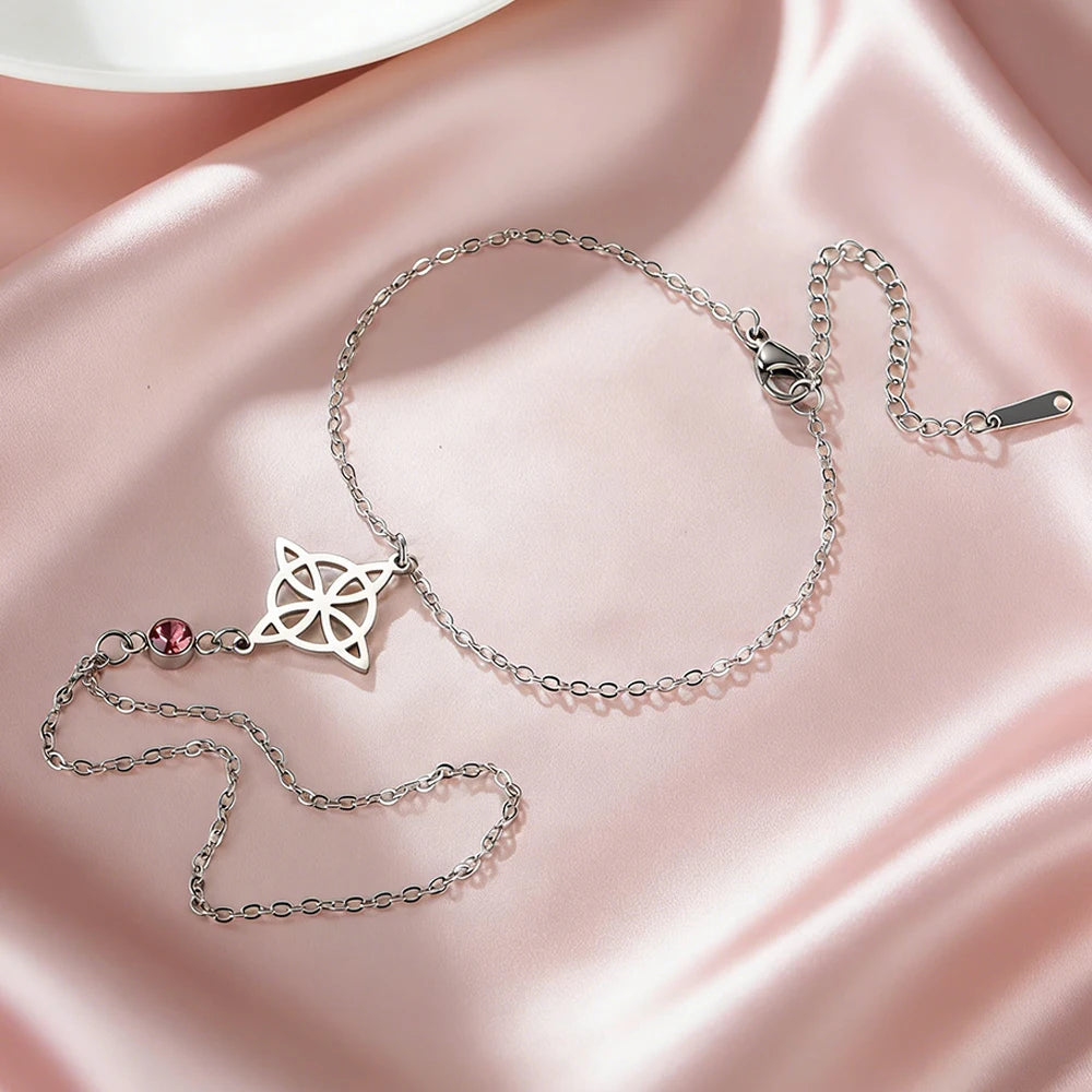 Fingerring‑Armband mit Hexenknoten, ein kraftvolles Amulett für Schutz