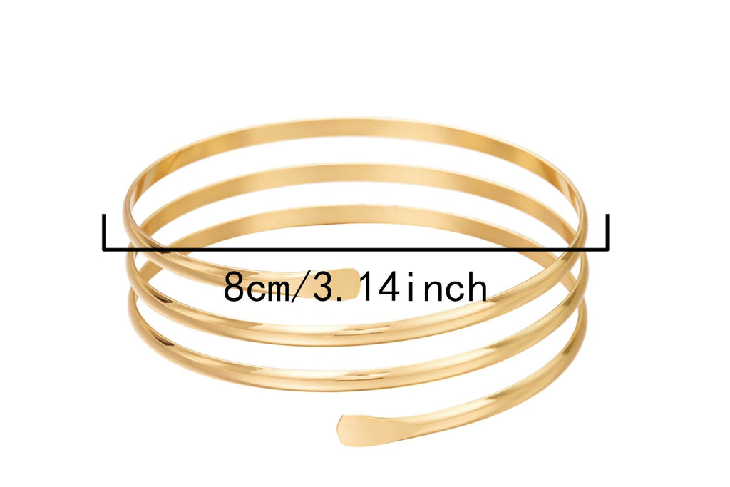 Goldfarbener Spiral‑Oberarmreif im minimalistischen Design