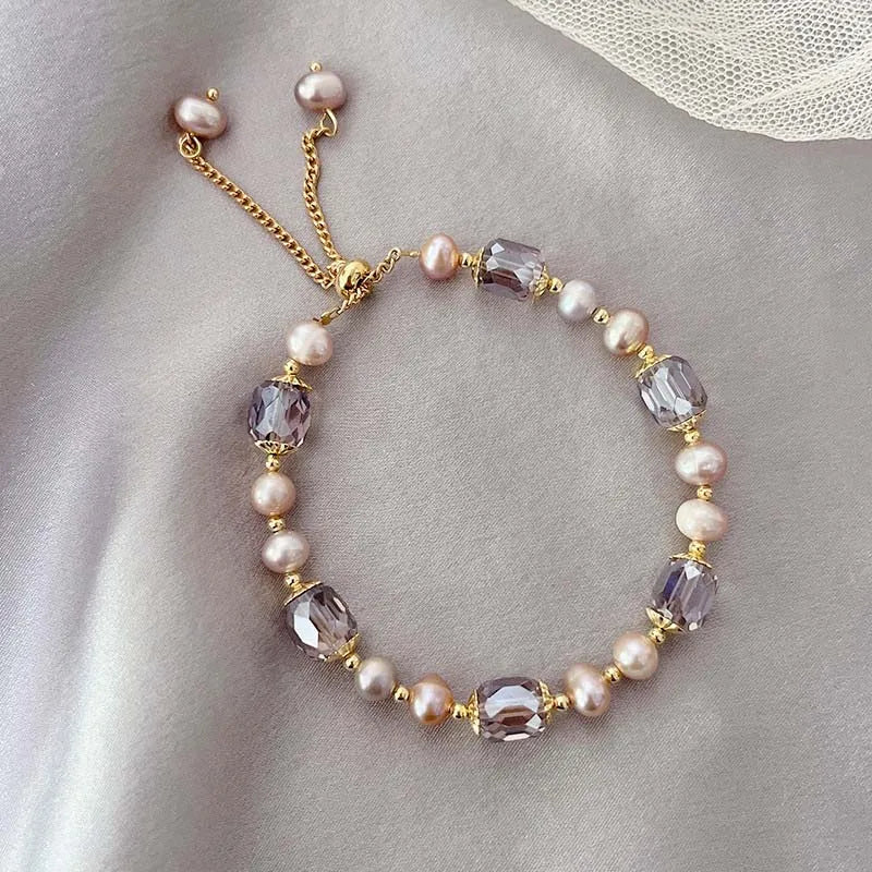 Damen‑Armband mit lila Imitationsperlen und Kristall‑Akzenten