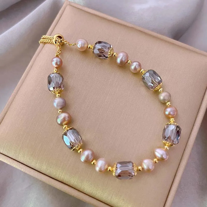 Damen‑Armband mit lila Imitationsperlen und Kristall‑Akzenten